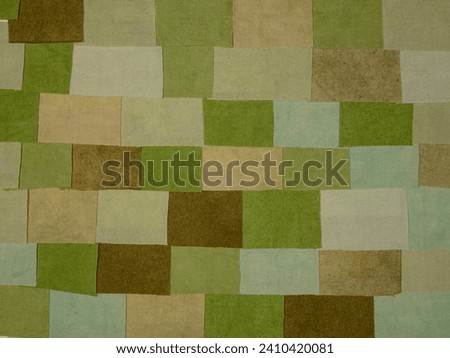 Handmade background in patchwork style with cotton fabric elements in green tones Royalty-Free Stock Photo #2410420081