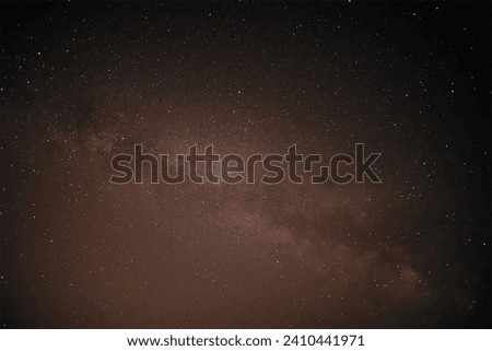 Astro photography in a desert nights cape with Milky Way galaxy. The background is stary celestial bodies in astronomy
