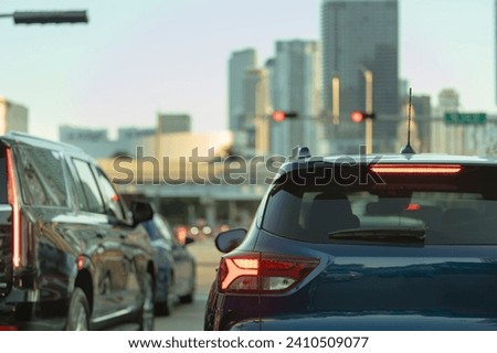Traffic on American street with driving cars in Miami, Florida. USA transportation