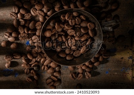 Roasted coffee beans- dark food photography. Clip art dramatic  photo