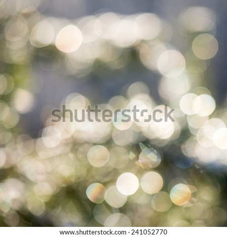 bright festive blur background with beautiful bokeh effect