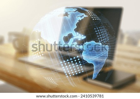 Digital America map and modern desktop with computer on background, international trading concept. Multiexposure Royalty-Free Stock Photo #2410539781