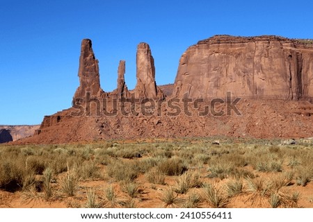 “3 Sisters”, Monument Valley, Arizona, USA. October 2023 Royalty-Free Stock Photo #2410556411