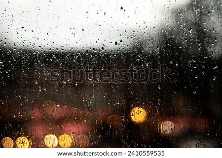 Raindrops on the window in winter 
