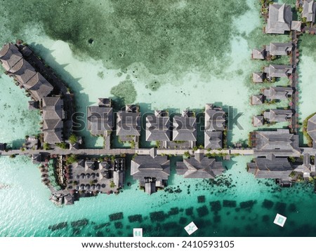Drone view of Mabul Island, the base for diving in Sipadan Island, Sabah state in Malaysia. Royalty-Free Stock Photo #2410593105