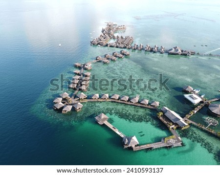 Drone view of Mabul Island, the base for diving in Sipadan Island, Sabah state in Malaysia. Royalty-Free Stock Photo #2410593137