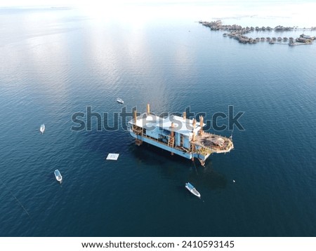 Drone view of Mabul Island, the base for diving in Sipadan Island, Sabah state in Malaysia. Royalty-Free Stock Photo #2410593145