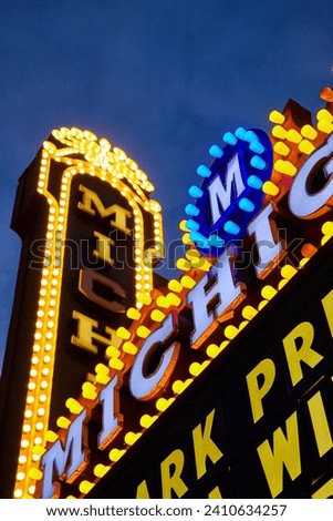 Vibrant Marquee Sign Lights at Dusk, Entertainment Venue Glow
