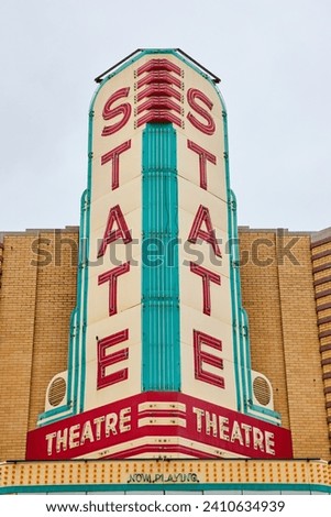 Vintage Theater Marquee Sign in Teal and Red, Upward Perspective