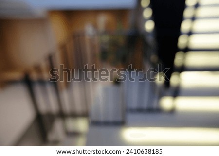 Blur focus of  stairs with decorative led illumination in modern interior space.