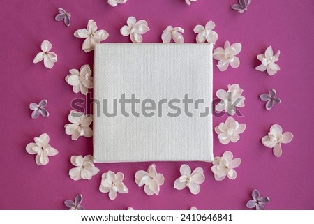 Composition frame made of beautiful spring lilac flowers. Mockup card invitation greeting card postcard copy space template blank. Branches of lilac blooming bouquet