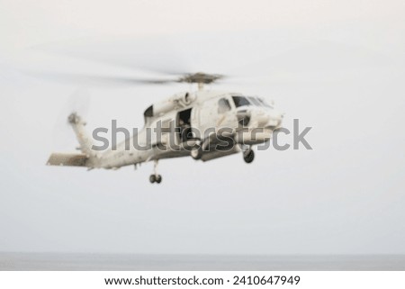 Blurred image of a white helicopter in the air. Beautiful photos on the theme of air medical services.air transport ambulance fast city transportati:Use for website banner background,backdrop