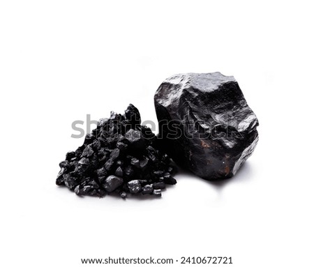Shilajit Rocks (Ayurveda)  isolated on white background_ Royalty-Free Stock Photo #2410672721