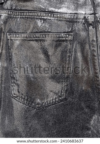  Close Up of Black Denim Jean Texture with Back Pocket Detail.