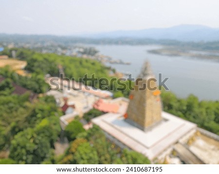 High angle blurred image of Sangkhlaburi Chedi, Thailand:Use for website banner background,backdrop