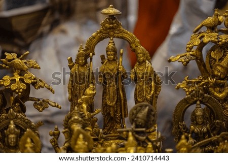 Brass metal art, Handmade Indian God Ram idol souvenir made with brass with blur background. Selective focus. Royalty-Free Stock Photo #2410714443