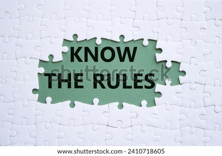 Know the rules symbol. White puzzle with words Know the rules. Beautiful grey green background. Business and Know the rules concept. Copy space.