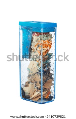 Closeup view of transparent pencil sharpener isolated over white background