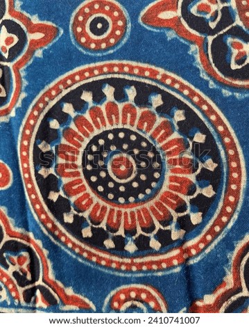 Mandala design in blue black maroon block printed on ajrakh fabric 