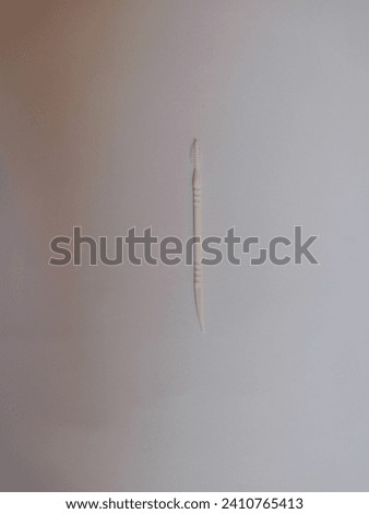 White modern plastic toothpick, tusuk gigi modern bahan plastik Royalty-Free Stock Photo #2410765413