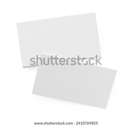 Blank business cards isolated on white, top view. Mockup for design