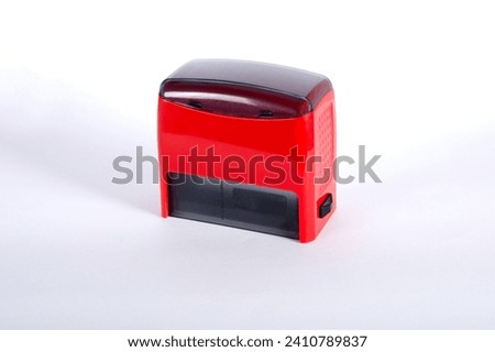 Rubber stamp. Mechanism of a seal on a white background. Red, office, automatic, rubber stamp