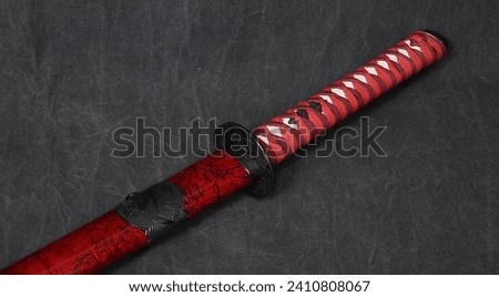 Korean sword image, red scabbard Royalty-Free Stock Photo #2410808067