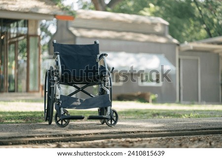 Elderly care concept. wheelchair outdoor.