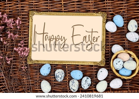 golden picture or photo frame mockup with pink baby's breath, gypsophila and eggs on esparto halfah background. happy easter concept