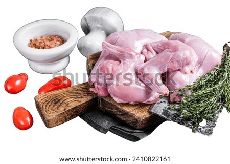 Raw hare legs on a butcher board with thyme. Isolated on white background, top view
