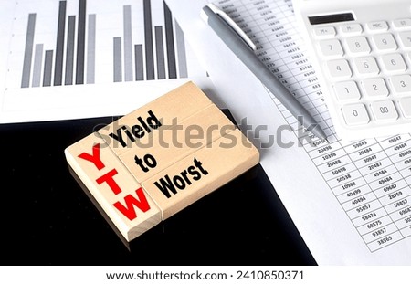 Word YTW Yield To Worst made with wood building blocks, business
