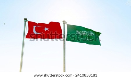 Turkey and Saudi Arabia Flags are waving in the spring of the blue sky. 4K ULTRA HD. 