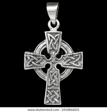 Silver Celtic cross pendant. 925 silver. Accessories for rockers, metalheads, punks, goths. Royalty-Free Stock Photo #2410866031