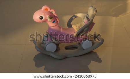 Unicorn-shaped rocking chair made for children.