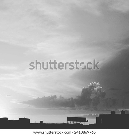 Black and white Sunset on the right and up coming thunder on the right .Its shows how beautiful the day was and  now the whole night will be full of thunder lighting.
This Picture captured on EID 2023
