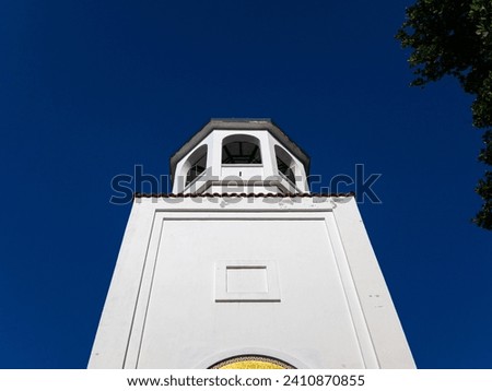 White bell tower of church Royalty-Free Stock Photo #2410870855