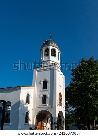 White bell tower of church Royalty-Free Stock Photo #2410870859