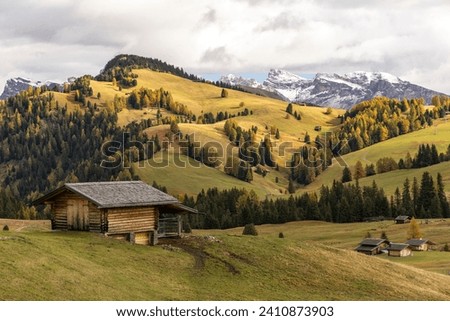 Seiser Alm (Alpe di Siusi) is a Dolomite plateau and the largest high-altitude Alpine meadow in Europe. Royalty-Free Stock Photo #2410873903