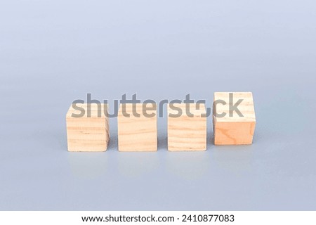 Wooden geometric shapes cube for conceptual design. Education game. isolated on gray background.