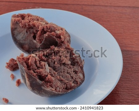 Sour beef Thai food style, fermented beef with garlic and salt. Royalty-Free Stock Photo #2410941823