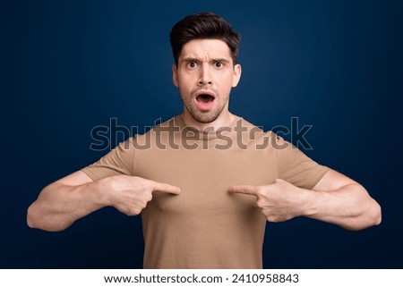 Photo of worried nervous speechless man wear trendy clothes pointing himself mistake failure isolated on dark blue color background