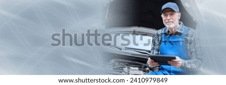 Car mechanic using digital tablet for checking car engine; panoramic banner