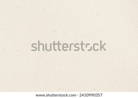 Paper texture cardboard background close-up. Cream light grunge old paper surface texture Royalty-Free Stock Photo #2410990357