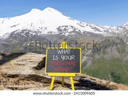 What is your personal brand symbol. Concept words What is your personal brand on beautiful blackboard. Beautiful mountain Elbrus background. Business, what is your personal brand concept. Copy space.