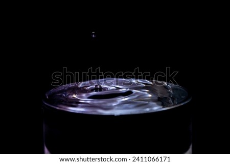 The drop that makes the glass overflow. Royalty-Free Stock Photo #2411066171