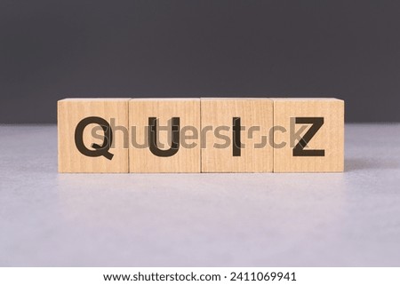 cubes form the word quiz. quiz word concept - finance, market and investment