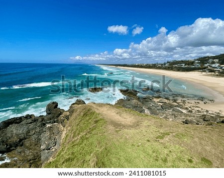 rocky sandy beach in australian summer