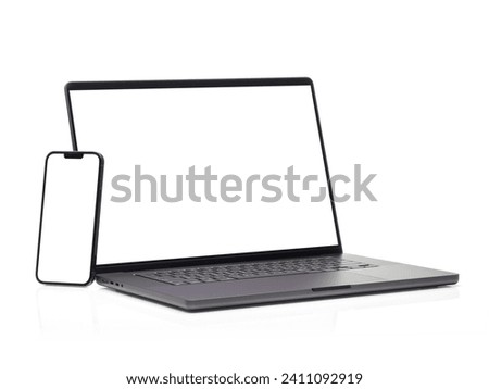 Laptop and smart phone with blank screen isolated on transparent background with clipping path.	