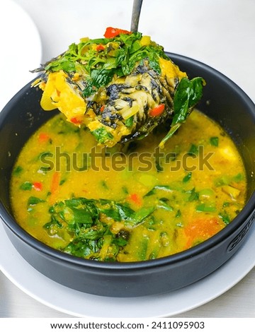 This is a picture of Indonesian local food, and here is a pic of Fish curry