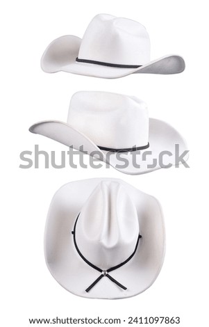 Rodeo rider, wild west, American and country music concept theme with a cowboy hat isolated on white background with cut out clip path image Royalty-Free Stock Photo #2411097863